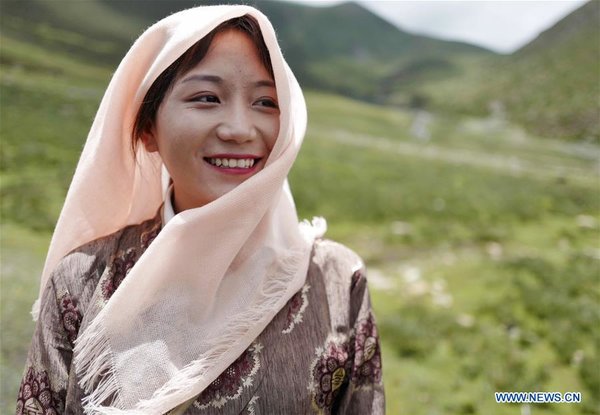 Female Pilot from Impoverished Family Flies Helicopter in China's Tibet