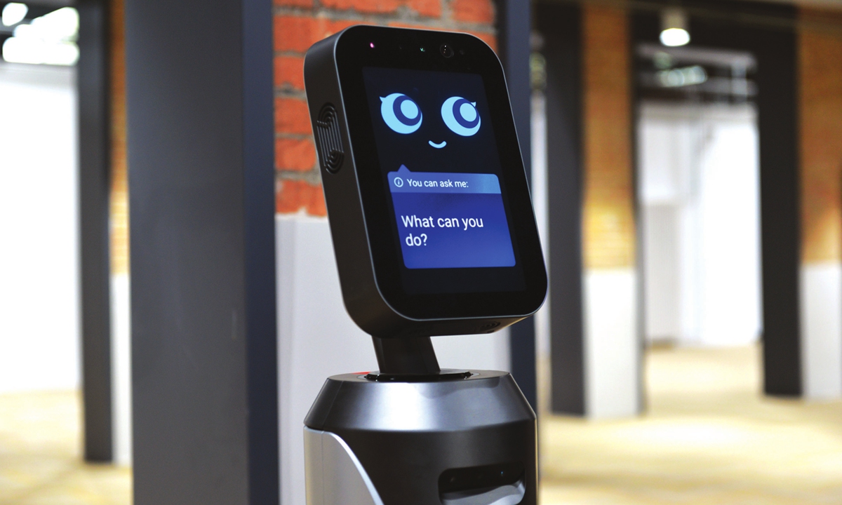 An audio robot with navigation function at the reception center for Olympic delegation groups in Beijing Photo: Zhao Juecheng/GT